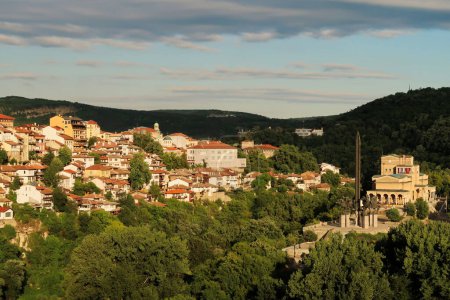 Spectacular view onto the old town and the Monument to the Asen, Assen Dynasty at sunset, Veliko Tarnovo, Bulgaria 2022