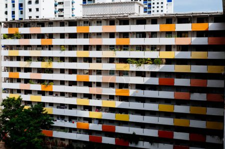 Photo for Colorful Facade of a Housing Development Board HDB Public Housing Apartment Block In Singapore Toa Payoh Estate - Royalty Free Image