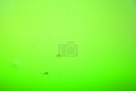 Photo for Oil and water do not mix, lime green - Royalty Free Image