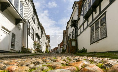 Photo for Editorial Rye, UK - April 26, 2023: An old pedestrian cobbled street in the beautiful town of Rye in England U - Royalty Free Image