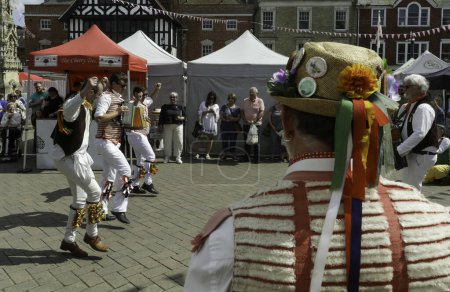 Photo for Editorial Saffron Waldon, UK - June 03, 2023: English traditional Morris dancers performing in Saffron Waldon U - Royalty Free Image