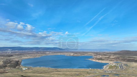 Photo for Lake Most anthropogenic pond water territory of Stary Most district city of Most in Usteckem Region. It was created result of reclamation of former lignite mine, The maximum depth is 71 m, mining past - Royalty Free Image