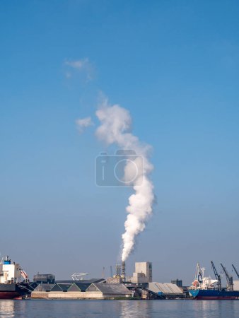 Photo for AMSTERDAM, NETHERLANDS - OCT 10, 2021: Phosphate fertilizer manufacturing plant in western docklands harbour at North Sea Canal - Royalty Free Image