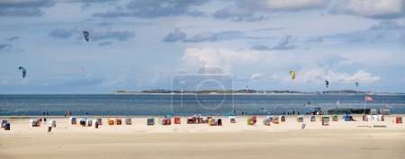 Photo for Amrum, Germany - Aug 26, 2023: Panorama of Kniepsand beach in Norddorf, Amrum island, North Frisia, Schleswig-Holstein - Royalty Free Image