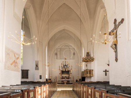 Photo for Mariager, Denmark - Sep 20, 2023: Interior view of Mariager Church, featuring pulpit and choir with altar, Nordjylland - Royalty Free Image