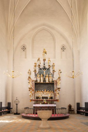 Photo for Mariager, Denmark - Sep 20, 2023: Interior view of Mariager Church, featuring choir with altar and altarpiece, Nordjylland, Denmark - Royalty Free Image