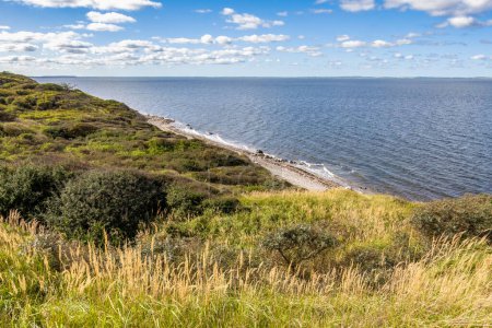 View of cliffs overlooking the sea of Limfjord on Livo island, Nordjylland, Denmark