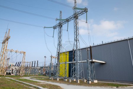 Photo for The outdoor extra high voltage power transformer. A high-voltage power electrical substation. - Royalty Free Image