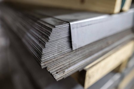 Photo for A stack of galvanized thick hot rolled steel sheets in a warehouse - Royalty Free Image