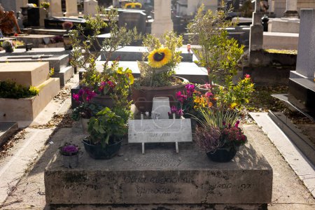 Photo for A grave of Serge Gainsbourg on Montparnasse Cemetery, Paris, France. He was of a French actor, composer, chansonnier, screenwriter, writer. Known for outrageous acts in creativity and everyday life - Royalty Free Image