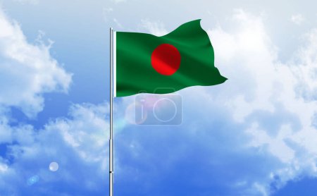 The flag of Bangladesh waving on the shiny blue sky