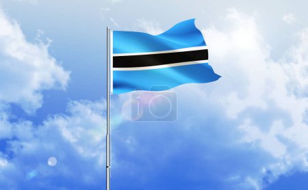 The flag of Botswana waving on the shiny blue sky