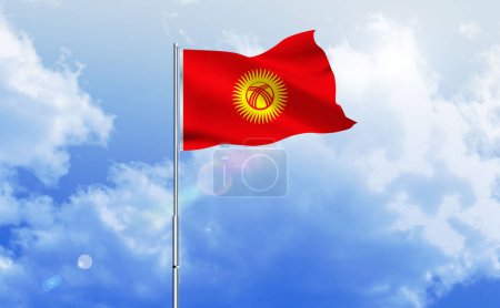 The flag of Kyrgyzstan waving on the shiny blue sky