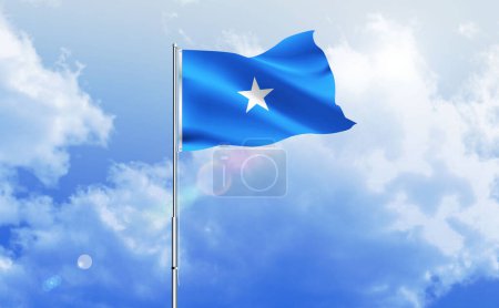 The flag of Somalia waving on the shiny blue sky