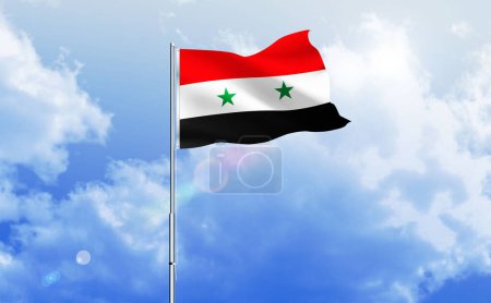 The flag of Syria waving on the shiny blue sky