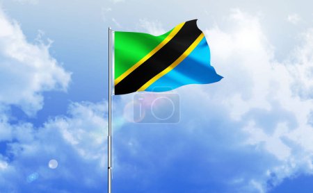 The flag of Tanzania waving on the shiny blue sky