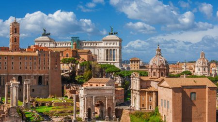 Ancient ruins, classical monuments, renaissance tower and baroque domes in the historical center of Rome 