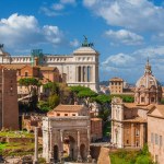 Ancient ruins, classical monuments, renaissance tower and baroque domes in the historical center of Rome