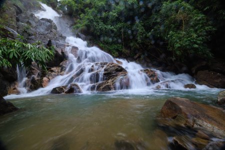 Photo for Beautiful nature landscape Krating waterfall in the rainy season and refreshing greenery forest in the national park of Khao Khitchakut Chanthaburi province Thailand, wide angle shot, water drop in front - Royalty Free Image