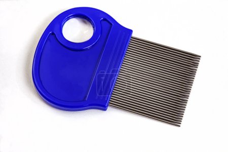 Photo for Hair lice comb, for removing nits with blue handle and small magnifying glass. isolated on white - Royalty Free Image