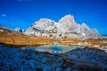 The Tre Cime di Lavaredo also called the Drei Zinnen are three distinctive battlement-like peaks, in the Sexten Dolomites of northeastern Italy.