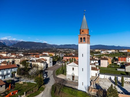 Photo for Bell tower of the church of Raspano di Cassacco - Royalty Free Image