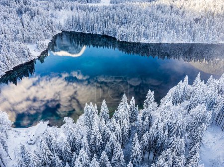 Photo for Scenic shot of frozen Fusine lakes in forest of Tarvisio, Italy - Royalty Free Image