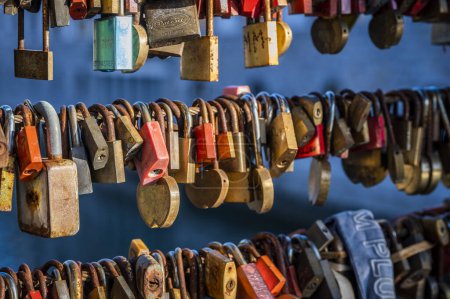 Photo for Close-up shot of symbolic love padlocks on bridge in city of Ljubljana, Slovenia - Royalty Free Image