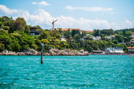 Photo for View from sea at beautiful Italian town on seashore - Royalty Free Image