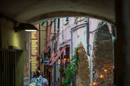 Photo for People walking on city street. Cinque Terre. Monterosso ancient village - Royalty Free Image