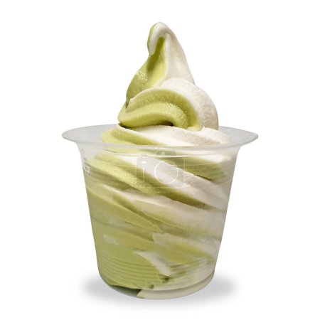 Soft serve ice cream in a transparent cup isolated on white background. Mix Matcha Green Tea Vanilla twist flavor. Cold and sweet dessert. Clipping path and copy space, no label for mock up design.