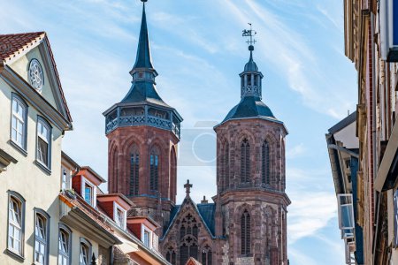 Photo for Facades of the old town of Goettingen with view of the church towers of St. Johannis Church, Goettingen. More pictures from Goettingen in my collection - Royalty Free Image