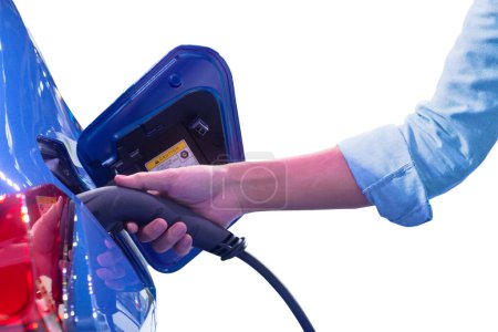 Close-up hand man who holding electric charge machine for rechargeable battery with blue electric car, Zero Emission Vehicle (ZEV), Battery Electric Vehicle (BEV), Hybrid Electricity Vehicle (HEV)