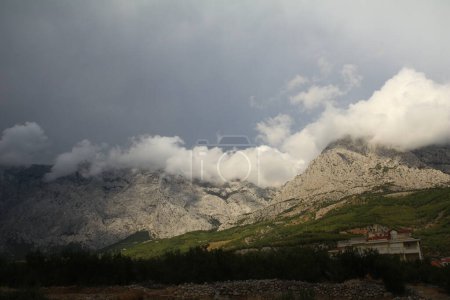 Photo for Cloudy sky over the Biokovo mountain range in Croatia - Royalty Free Image