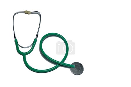 Photo for Examination with a stethoscope green medical stethoscope on the table for children - Royalty Free Image