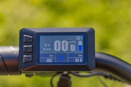 Photo for Speed counter, odometer on the handlebar of an electric bike - Royalty Free Image