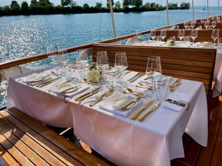 Photo for Sunset dinner on board of historic steamer on Lake of Constance, Vorarlberg, Austria. High quality photo - Royalty Free Image