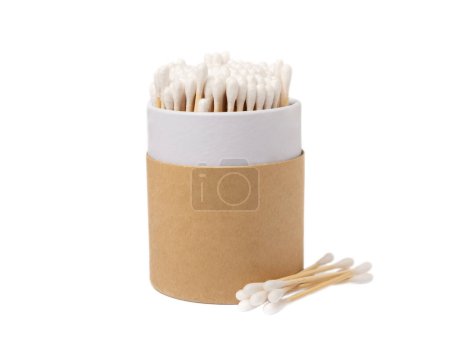 Cotton buds in eco kraft packaging isolated on white background. Cotton swab on a white background. Sticks for hygiene of the nose and ears. Bamboo cotton buds. Eco friendly.