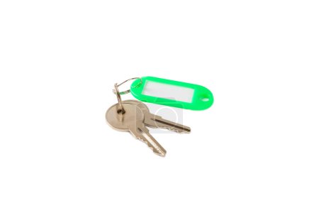 Téléchargez les photos : Porte-clés en plastique de différentes couleurs avec un endroit pour une signature isolée sur un fond blanc. Lot de clés avec porte-clés, isolées sur Blanc. Porte-clés maquillé. - en image libre de droit