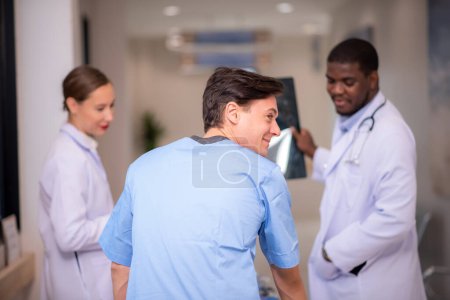 Photo for Professional doctors working in team at hospital - Royalty Free Image