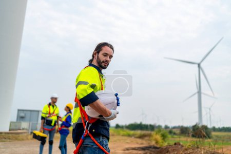 Photo for Wind turbine service engineer maintenance and plan for inspection at construction site, renewable electricity generator. - Royalty Free Image