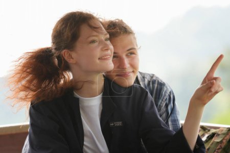 Photo for Close up view of happy young couple embracing on boat - Royalty Free Image