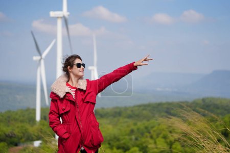 Photo for Lonely beautiful woman on rural road. Attractive fashion girl spending vacation in countryside - Royalty Free Image