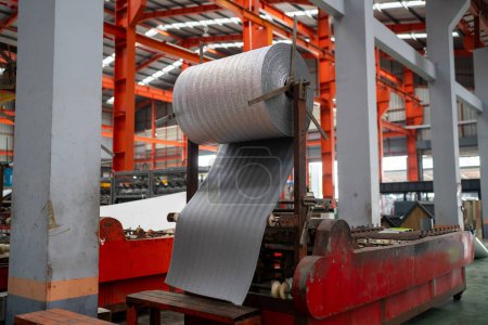 Foto de Interior of metal sheet manufaturing equipmenand machines in production line. - Imagen libre de derechos