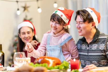 Photo for Merry Christmas! Happy family having dinner at home. Celebration concept - Royalty Free Image
