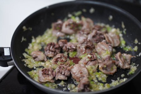 Photo for How to fry gizzard and green onions - Royalty Free Image