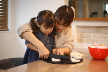 Photo for Parent and child cooking - Royalty Free Image