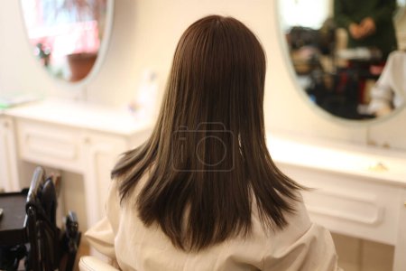 Photo for Back view of woman Beauty salon image - Royalty Free Image