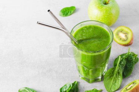Photo for Green Smoothie, Refreshing Spinach, Kiwi, Apple Drink, Healthy Food, Detox, Vegan or Vegetarian Diet Food Concept, Bright Background - Royalty Free Image