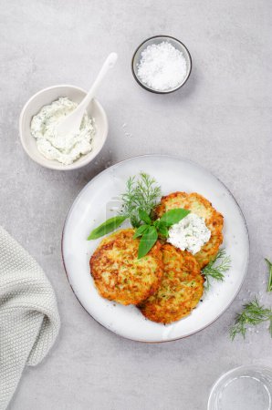 Zucchini Fritters with Herbs and Cream Cheese Topping, Tasty Vegetable Pancakes, Vegetarian Meal